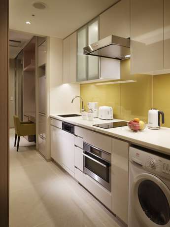 Imagen de la habitación del Hotel Oakwood Premier Tokyo. Foto 16