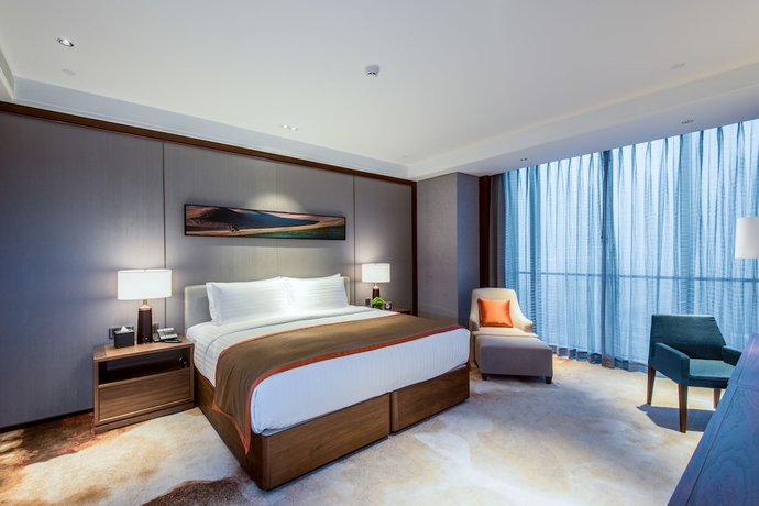 Imagen de la habitación del Hotel Oakwood Residence Damei Beijing. Foto 7