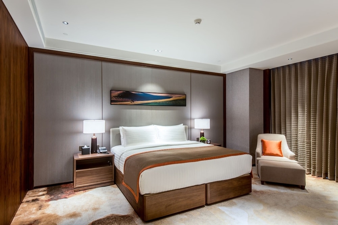 Imagen de la habitación del Hotel Oakwood Residence Damei Beijing. Foto 18