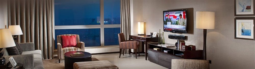 Imagen de los interiores del Hotel Oakwood Residence Hangzhou. Foto 7