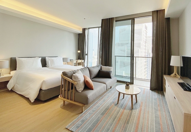 Imagen de la habitación del Hotel Oakwood Suites Bangkok. Foto 12