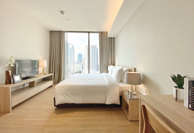 Imagen de la habitación del Hotel Oakwood Suites Bangkok. Foto 17