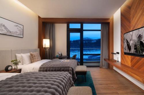 Imagen de la habitación del Hotel Oakwood Suites Chongli. Foto 16