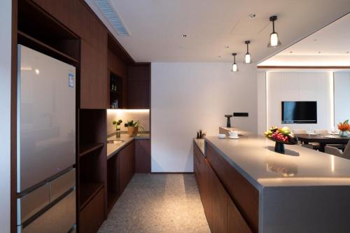 Imagen de la habitación del Hotel Oakwood Suites Chongli. Foto 19