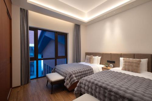 Imagen de la habitación del Hotel Oakwood Suites Chongli. Foto 20