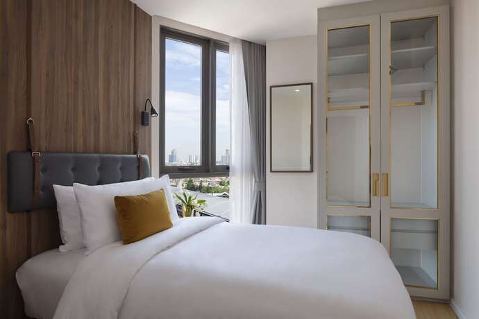 Imagen de la habitación del Hotel Oakwood Suites Tiwanon Bangkok. Foto 9