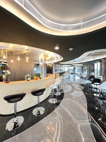 Imagen del bar/restaurante del Hotel Oakwood Suites Tiwanon Bangkok. Foto 3