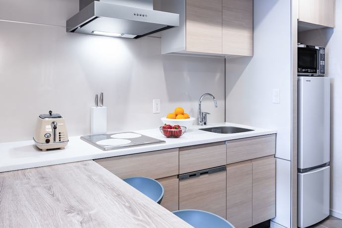 Imagen de la habitación del Hotel Oakwood Suites Yokohama. Foto 10