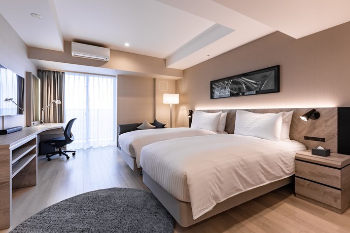 Imagen de la habitación del Hotel Oakwood Suites Yokohama. Foto 12