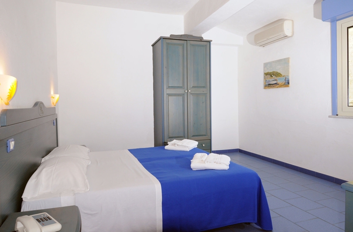 Imagen de la habitación del Hotel Oasi Azzurra Village. Foto 3