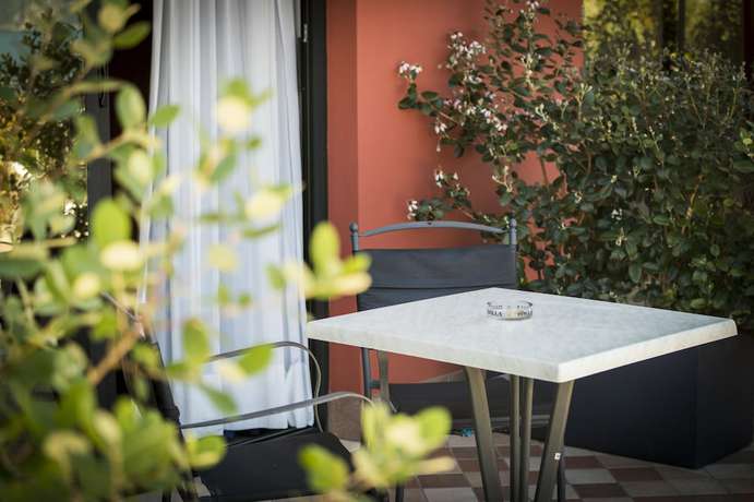 Imagen de la habitación del Hotel Oasi Beach. Foto 15