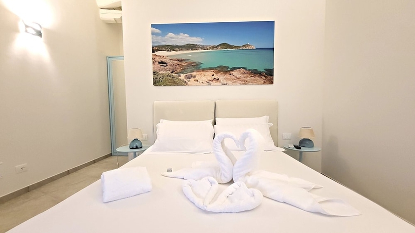 Imagen de la habitación del Hotel Oasi Blu Sardinia. Foto 6