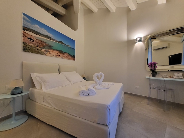 Imagen de la habitación del Hotel Oasi Blu Sardinia. Foto 7