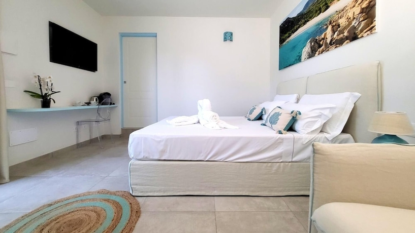 Imagen de la habitación del Hotel Oasi Blu Sardinia. Foto 11