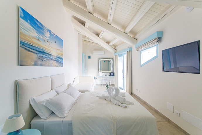 Imagen de la habitación del Hotel Oasi Blu Sardinia. Foto 12