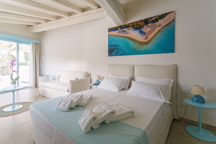 Imagen de la habitación del Hotel Oasi Blu Sardinia. Foto 14