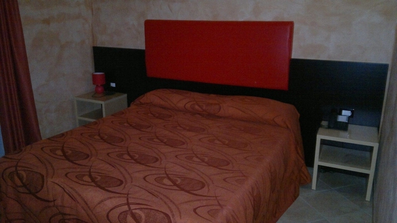 Imagen de la habitación del Hotel Oasi Del Visir Resort. Foto 7