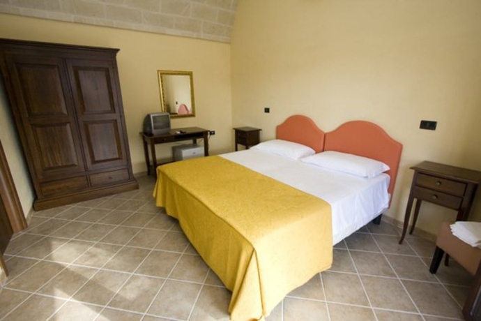 Imagen de la habitación del Hotel Oasi Del Visir Resort. Foto 11