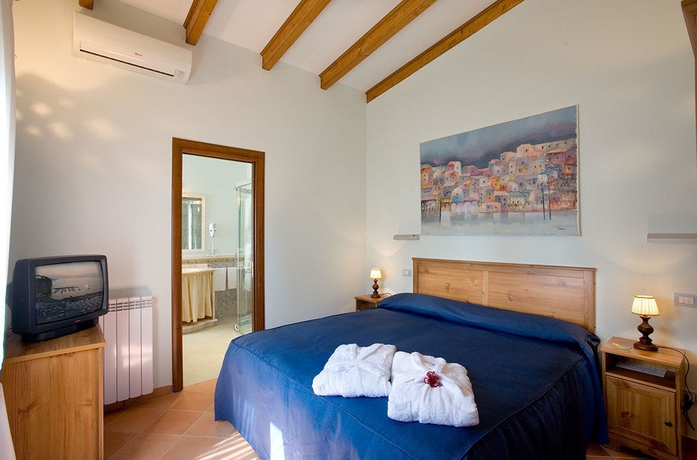 Imagen de la habitación del Hotel Oasi Olimpia Relais. Foto 8