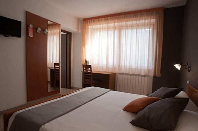 Imagen de la habitación del Hotel Oasi Verde. Foto 5