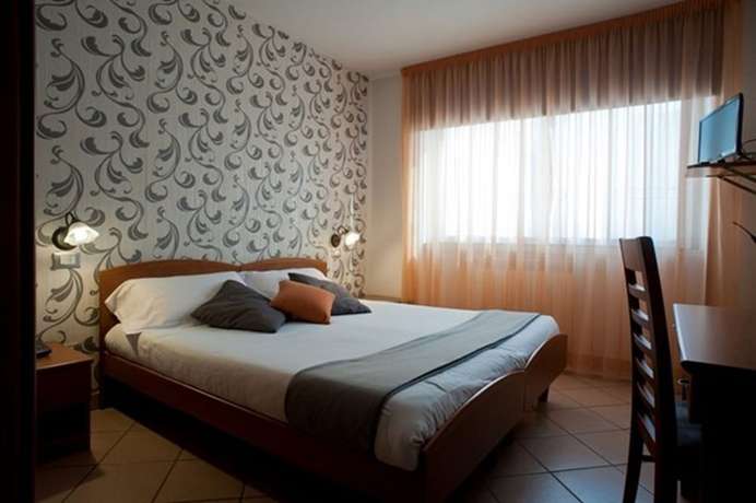 Imagen de la habitación del Hotel Oasi Verde. Foto 8