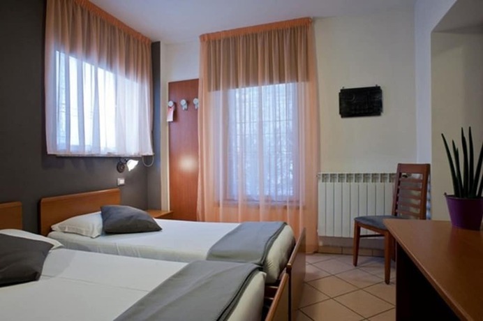 Imagen de la habitación del Hotel Oasi Verde. Foto 10