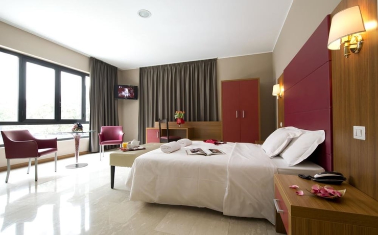 Imagen de la habitación del Hotel Oasi Village. Foto 2