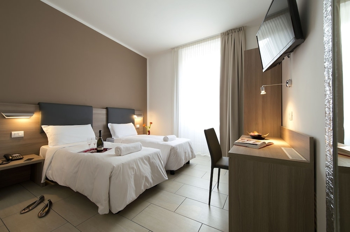 Imagen de la habitación del Hotel Oasi Village. Foto 5