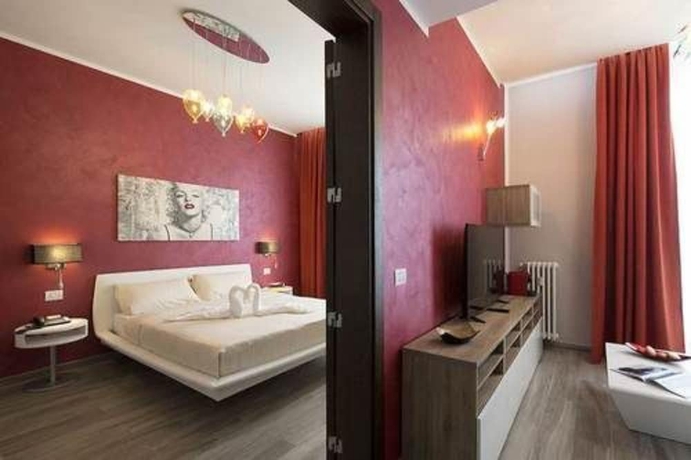 Imagen de la habitación del Hotel Oasi Village. Foto 7