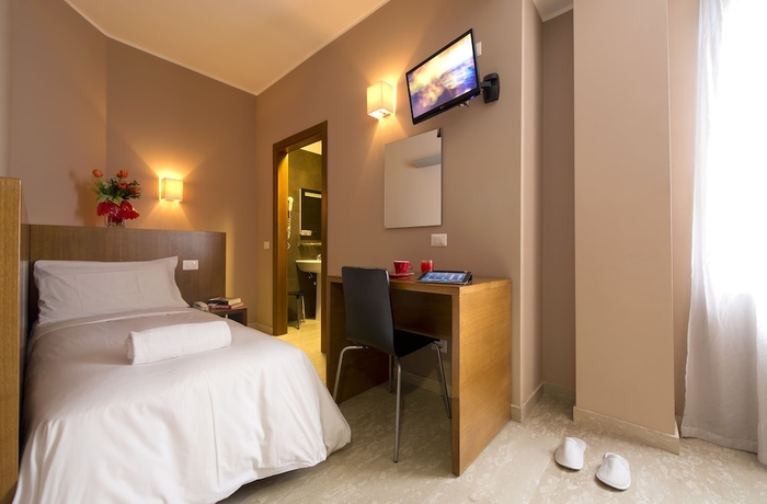 Imagen de la habitación del Hotel Oasi Village. Foto 9