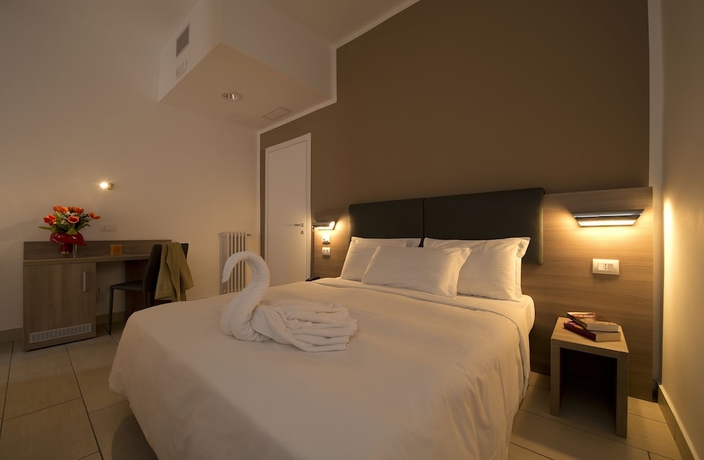 Imagen de la habitación del Hotel Oasi Village. Foto 10