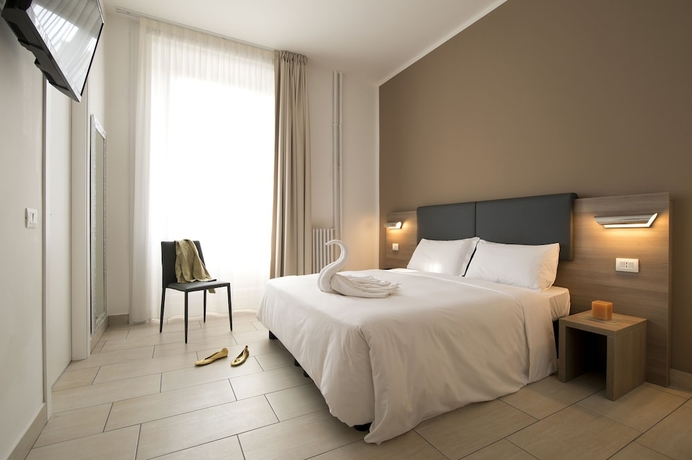 Imagen de la habitación del Hotel Oasi Village. Foto 13