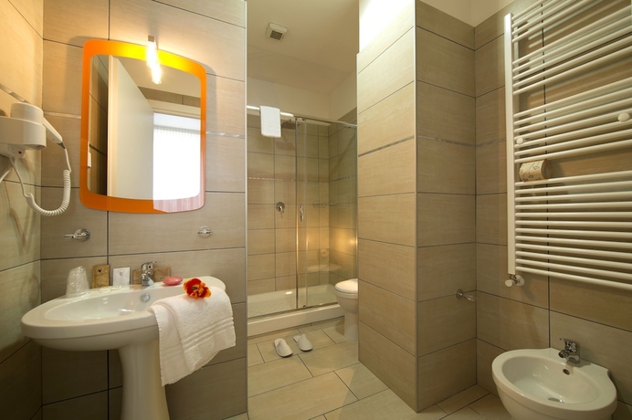 Imagen de la habitación del Hotel Oasi Village. Foto 16