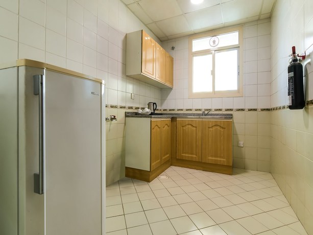 Imagen de la habitación del Hotel Oasis Apartment, RAS AL KHAIMAH. Foto 11