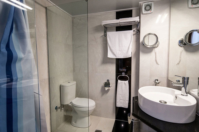 Imagen de la habitación del Hotel Oasis Apartments. Foto 3