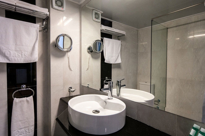 Imagen de la habitación del Hotel Oasis Apartments. Foto 4