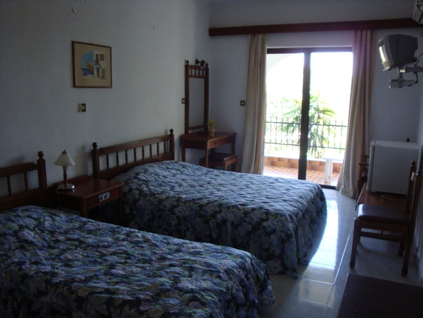 Imagen de la habitación del Hotel Oasis Bungalows Rodos. Foto 7