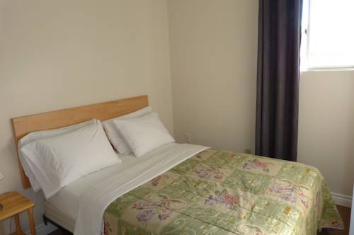 Imagen de la habitación del Hotel Oasis By The Bay Vacation Resort. Foto 7