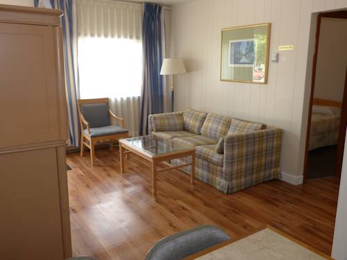 Imagen de la habitación del Hotel Oasis By The Bay Vacation Resort. Foto 10