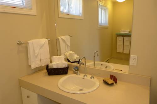 Imagen de la habitación del Hotel Oasis By The Bay Vacation Resort. Foto 11