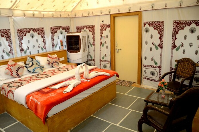 Imagen de la habitación del Hotel Oasis Camp Sam. Foto 17