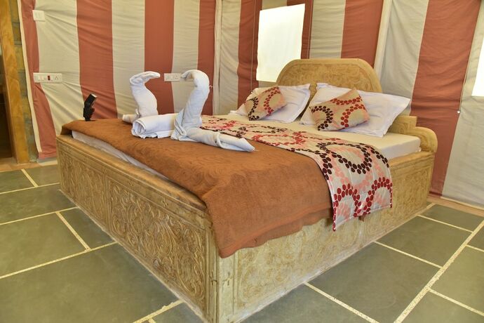 Imagen de la habitación del Hotel Oasis Camp Sam. Foto 18