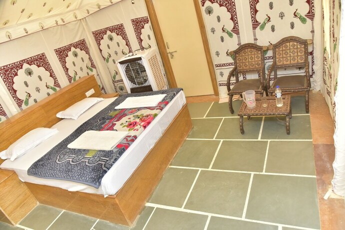 Imagen de la habitación del Hotel Oasis Camp Sam. Foto 21