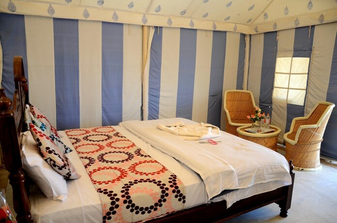 Imagen de la habitación del Hotel Oasis Camp Sam. Foto 22