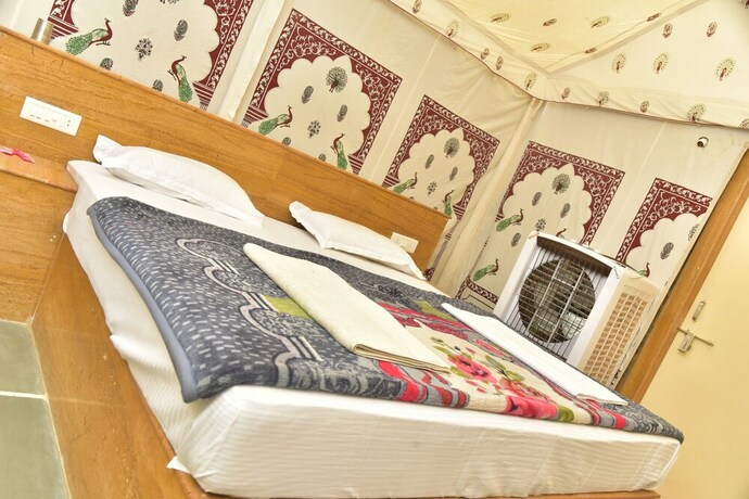 Imagen de la habitación del Hotel Oasis Camp Sam. Foto 29