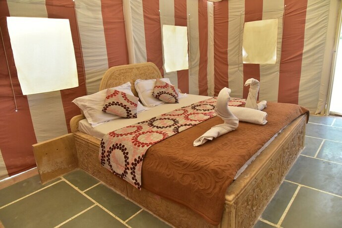 Imagen de la habitación del Hotel Oasis Camp Sam. Foto 32