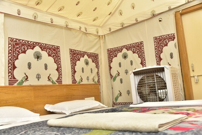 Imagen de la habitación del Hotel Oasis Camp Sam. Foto 34