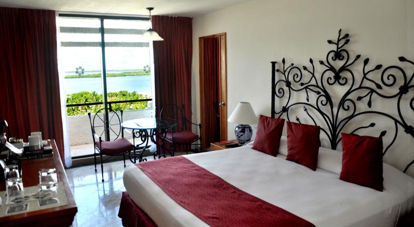Imagen de la habitación del Hotel Oasis Cancún Lite. Foto 5