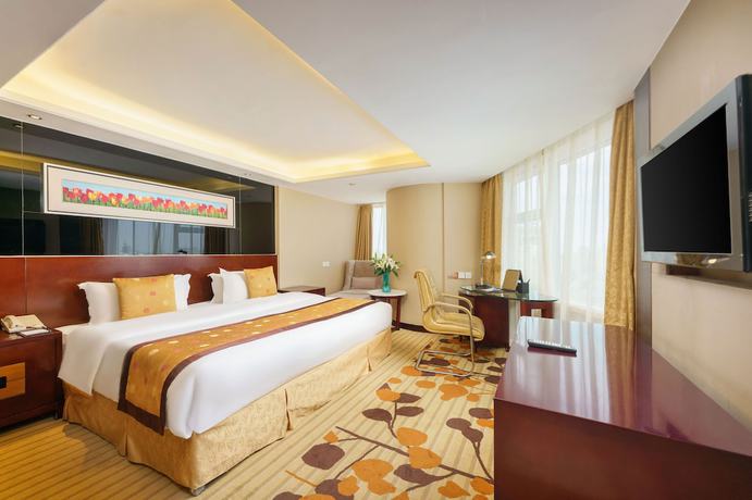 Imagen de la habitación del Hotel Oasis Grand Hotel. Foto 3