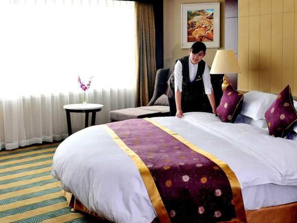 Imagen de la habitación del Hotel Oasis Grand Hotel. Foto 4